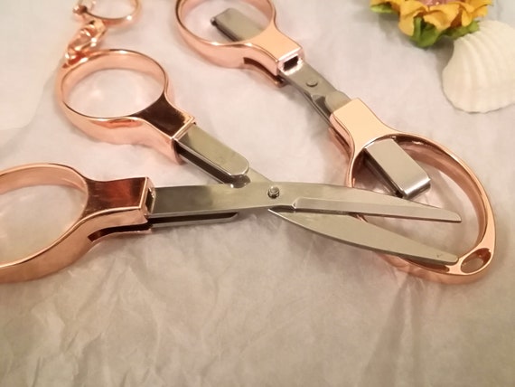 Multipurpose Glasses Shaped Mini Cutter Shear Portable Folding Scissors for  Travel - China Scissors, Folding Scissors