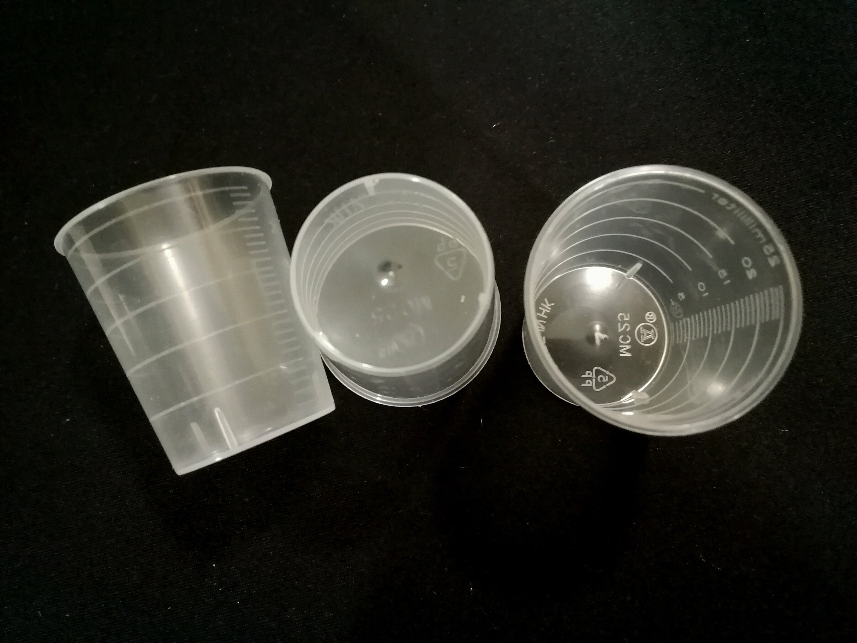 small plastic measuring cup 60ml