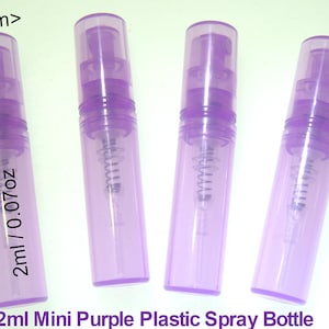 May include: Four 2 ml / 0.07 oz mini purple plastic spray bottles with a silver atomizer. The bottles are 55 mm tall and 11 mm wide.