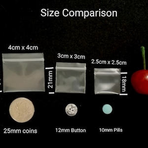 Mini 3cmx3cm / 2.5cmx2.5cm / 2cmx2cmZip Bag 100pcs Resealable Bag Small Clear Tiny Plastic Bag Zip Bag Reusable Plastic Bag Reclosable Bag Size measurements and size Comparison with a Cherry and a coin