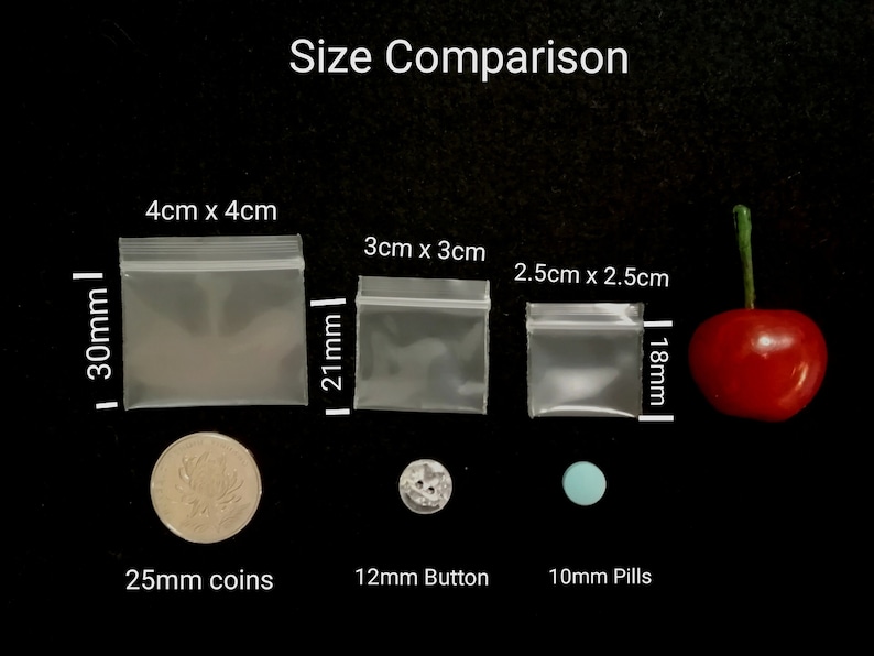 Mini 3cmx3cm / 2.5cmx2.5cm / 2cmx2cmZip Bag 100pcs Resealable Bag Small Clear Tiny Plastic Bag Zip Bag Reusable Plastic Bag Reclosable Bag Size measurements and size Comparison with a Cherry and a coin