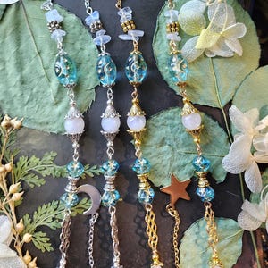 Light Blue Whimsical Eyeglass Chain | Czech Crystals | white opal Crystal | Moon Sun and Stars | Witch Chain for Glasses | Celestial Gift