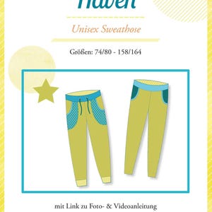 Könnte beinhalten: Illustration von zwei unisex Sweatpants in Hellgrün mit blauen und gepunkteten Akzenten. Der Text "Haven" und "Unisex Sweathose" sind über der Hose abgebildet. Die Größen sind 74/80 - 158/164.