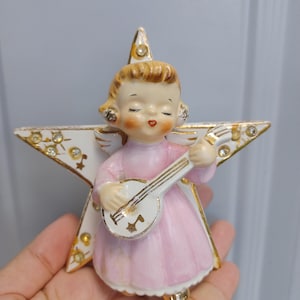 Figura colgante de pared de cerámica vintage de Norcrest, de los años 50, con forma de ángel sobre estrella y diamantes de imitación dorados.