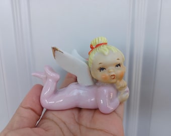 Figura de hada Shafford vintage de MCM con traje de conejita, estilo kitsch antropomórfico.