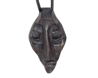 Pendentif en bois « Le Visage »