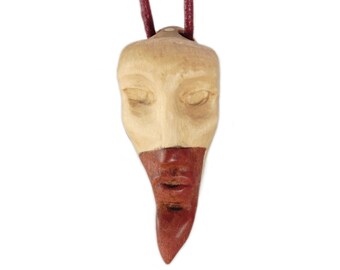 Pendentif en bois « Le Visage Rose »