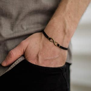 Infinity-armband voor mannen, herenarmband met zwarte snaar, bronzen oneindigheid, yoga-sieraden, Vaderdagcadeau voor hem, eindeloze bedelarmband