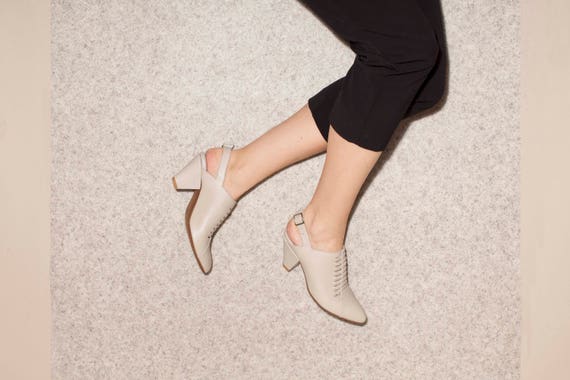 black and cream high heel shoes