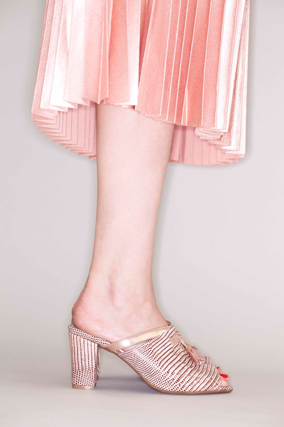 pink tassel mules