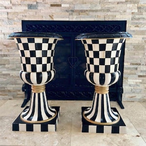 May include: A handmade wooden sign with the text "Welcome to our home" in a handwritten style. The sign is painted white with black lettering and a distressed finish, perfect for farmhouse decor.