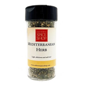May include: A clear plastic spice jar with a black lid containing dried green herbs. The label features the text Old Town Spice Shop, Mediterranean Herb, and Light, delicious and salt free!, along with the website www.oldtownspiceshop.com.