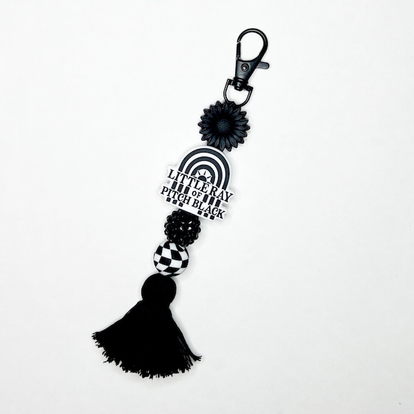 Little Ray of Pitch Black rainbow tassel keychain