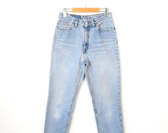 Vintage 90s Levi's High Waisted Slim Jeans - Light Wash W27