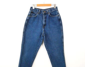 Vintage jaren 90 chique dames jeans met hoge taille en taps toelopende pijpen/momsjeans/W27