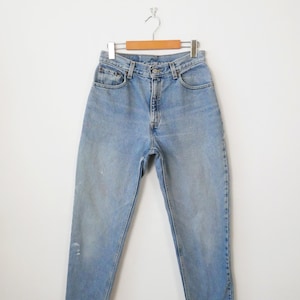 VintageLevi&#39;s Women&#39;s 550 High Waist Tapered Jeans/W27