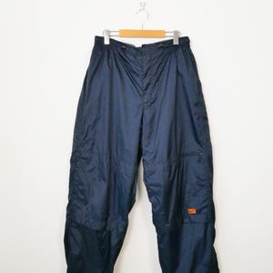 Vintage Y2K Nike Men’s Navy Blue Nylon Track Pants/W31-38