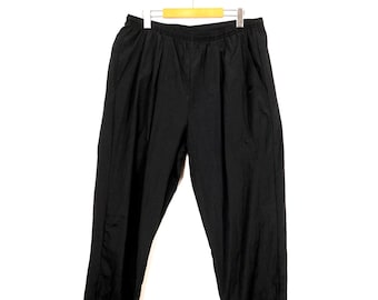 Vintage 1990s Nike mens black nylon track pants zip ankle