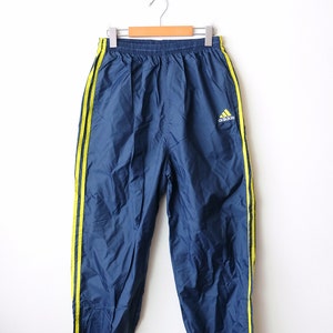 Pantaloni sportivi adidas vintage blu/giallo con tre strisce/W25