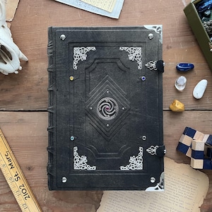 Le Repertoire - Silver Dragon and Dark Green leather -  an illustrated bestiary of fantastical and mythical creatures, monsters and beasts.