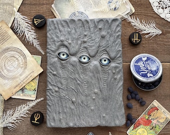 Le Repertoire Gris with three eyes - an illustrated bestiary of creatures, monsters and beasts.