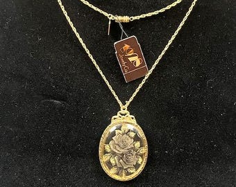 Vintage 1928 Jewelry Co brand necklace with beautiful floral pendant. Gold tone, mid century, w/ barrel clasp, with tag