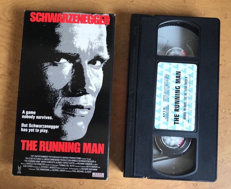 The Running Man VHS tape 1987 action adventure film A Game Etsy