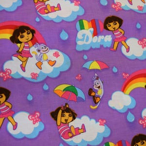 Dora Rain by Viacom International for Spring Creative Group. Fabric by the Yard #2936