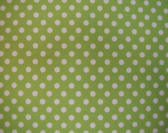 Lime Polka dots by Famous Names.  Fabric by the Yard.