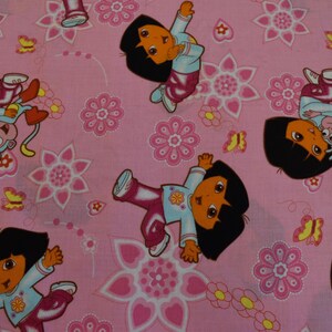 Dora by Viacom International from The Day Dreams Collection for Spring Creative Group. Fabric by the Yard #2935