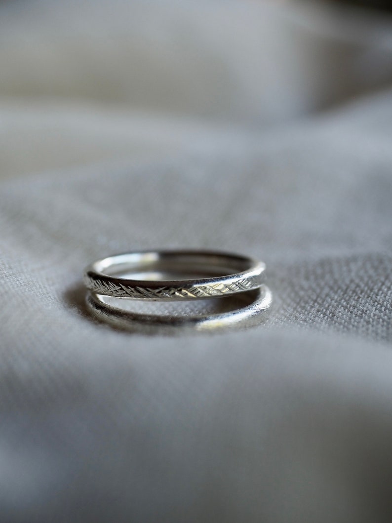 Pair of handmade silver rings with different textures R0053 image 10