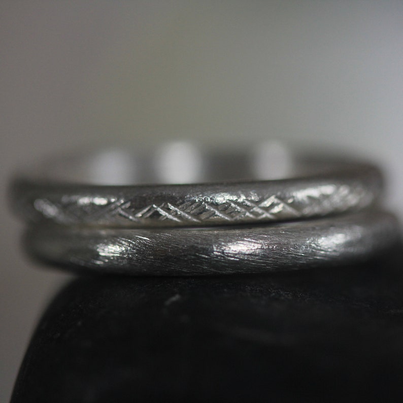 Pair of handmade silver rings with different textures R0053 image 1