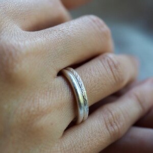 Pair of handmade silver rings with different textures R0053 image 2