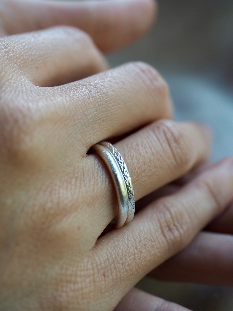 Pair of handmade silver rings with different textures R0053 image 2