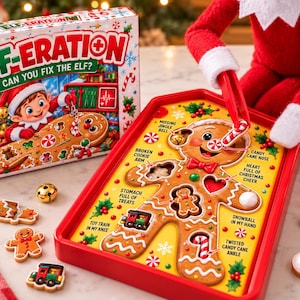 May include: The Elf-eration board game features a gingerbread person character with various cutouts for game pieces. The box displays the title Elf-eration Can You Fix The Elf? and includes small plastic game pieces like a train, candy cane, and bell.