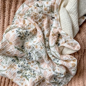 Manta de bebé de muselina con diseño floral de jardín de margaritas