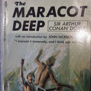 May include: The cover of a paperback book titled "The Maracot Deep" by Sir Arthur Conan Doyle. The book features a green background with a painting of two people swimming in the ocean.