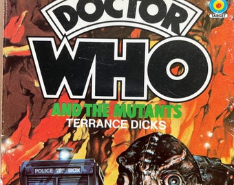 May include: A vintage paperback book cover featuring the title "Doctor Who and the Mutants" by Terrance Dicks. The cover art depicts a futuristic cityscape with a large, menacing creature in the foreground.
