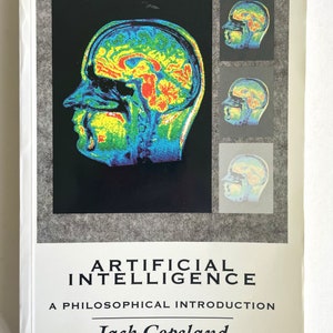 May include: Book cover with a black and white image of a human brain with a colorful scan overlay. The title is "Artificial Intelligence: A Philosophical Introduction" by Jack Copeland.