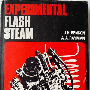 Puede incluir: Una portada de libro con el título "EXPERIMENTAL FLASH STEAM" en letras blancas sobre fondo negro. Los autores son J.H. Benson y A.A. Rayman. La portada también presenta una ilustración en blanco y negro de una máquina de vapor.
