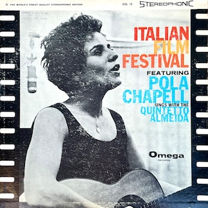 May include: Vintage album cover for the Italian Film Festival featuring Pola Chapell, singing with the Quintetto Almeida. The cover has a black and white photo of a woman with a guitar. The text is in orange, blue, and white.