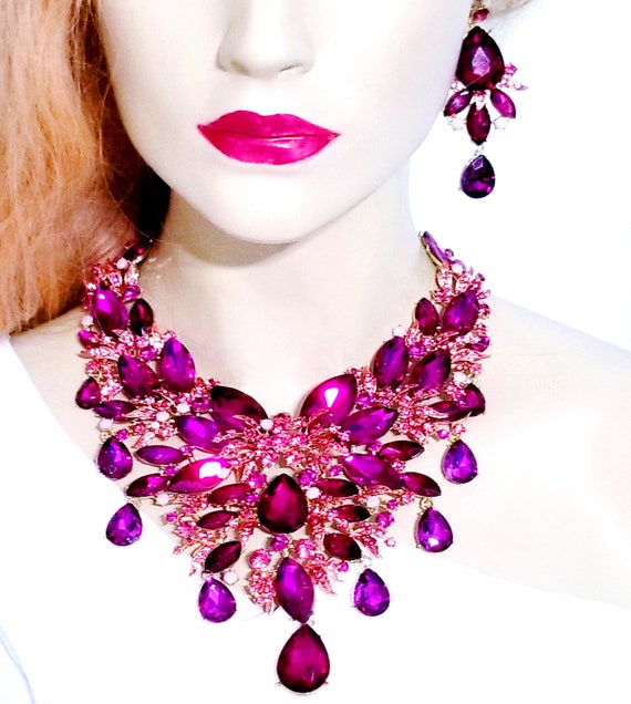 Sterling Silver Pink Rhodonite Arrowhead Gemstone Squash Blossom State –  American West Jewelry