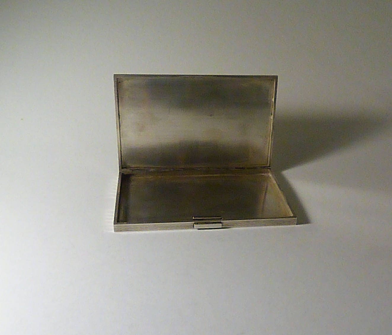 vintage cigarette rolling case Our featured estate pieces are vintage cigarette rolling paper cases that  have been thoughtfully repurposed as lockets. Popular in the late 19th and  early 20th centuries, these elegant, portable cases were originally