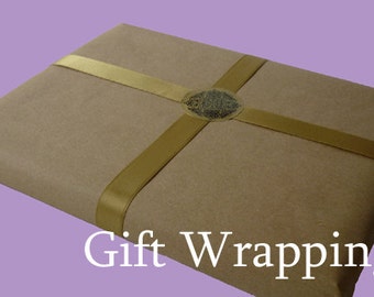 Brown paper gift wrap with gold ribbon and a decorative sticker, gift wrapping service, unique gift wrapped present, antique gifts for him