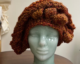 Handknit free form non wool Hat in rust tones and textures