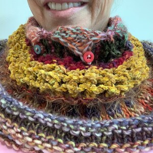 Hand knit soft infinity scarf shoulder wrap adornment with multiple stitch and color textures