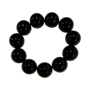 May include: A black beaded bracelet with round beads.