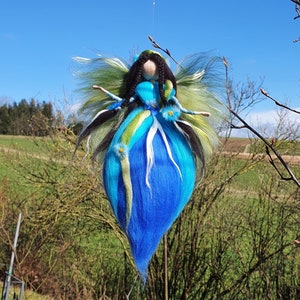 Fairy angel elf turquoise blue with braids and flowers felted from wool