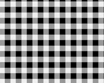 May include: Black and white checkered pattern. The pattern is made up of squares.