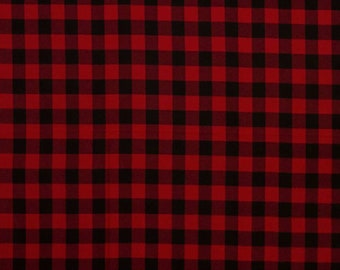 May include: Red and black checkered fabric with a repeating pattern.